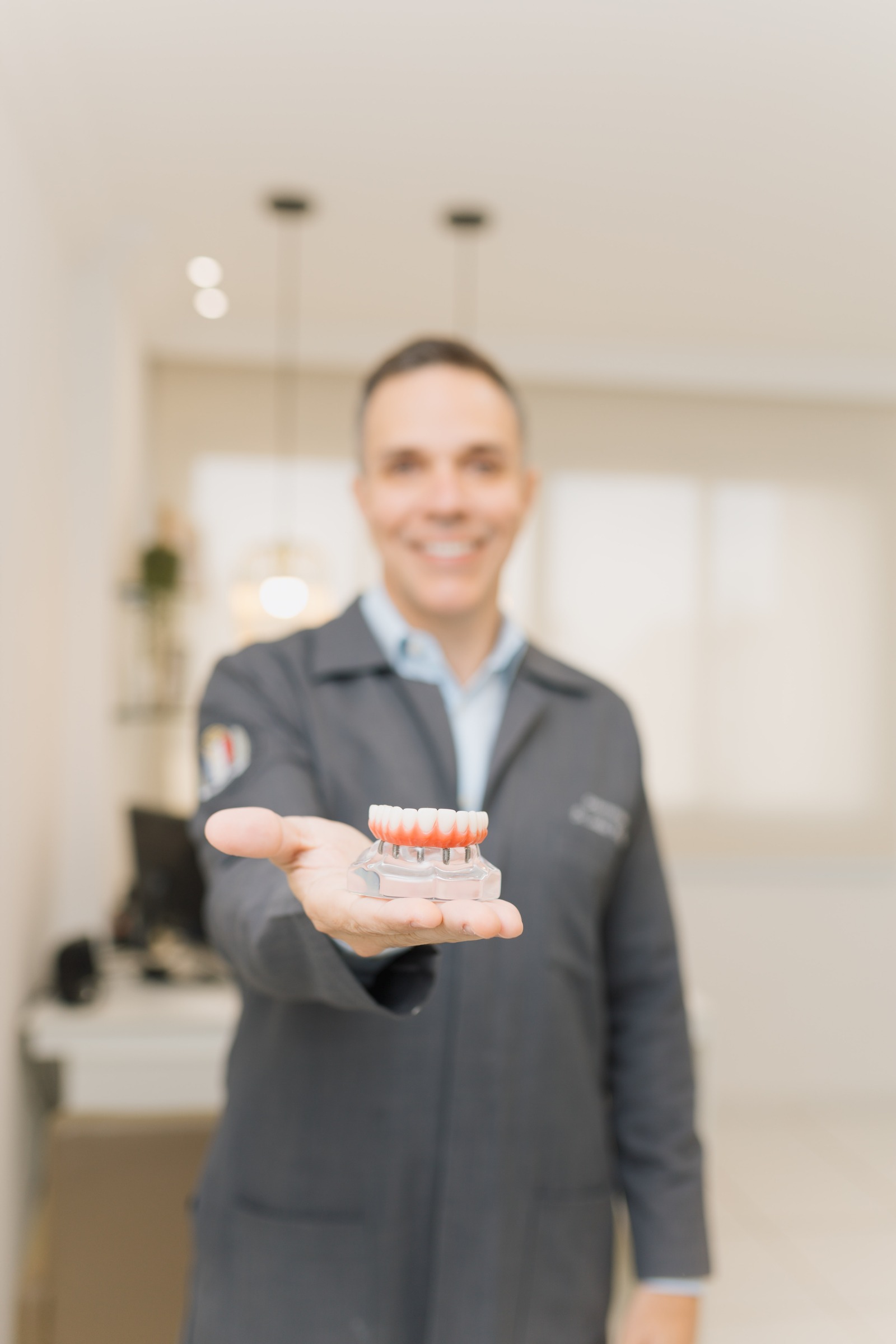 Modelo de prótese sobre implantes dentários